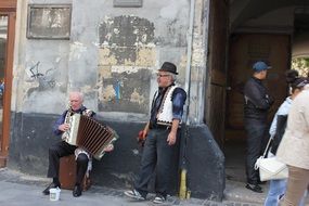 two old street musicians, ukraine, lviv