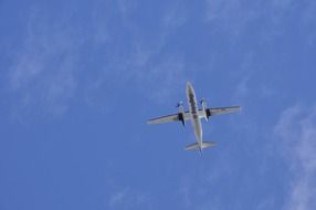 tourist plane flies in the clear sky