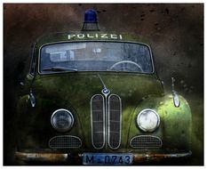 old green police car