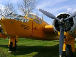 propeller of yellow airplane close up