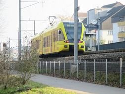 Colorful public train on the railway