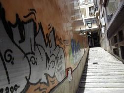 staircase along the wall with graffiti in Mallorca