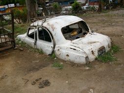 old car in the mud