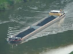 ship with coal on river