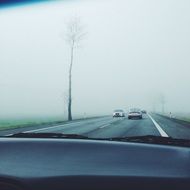 windshield on the background of the road in the fog