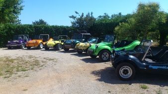 multi-colored buggies on the road