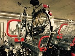 bicycle in a parking lot in a railway tunnel