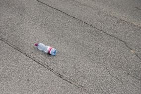 Plastic bottle on a road