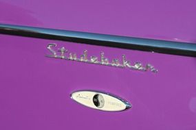 vintage logo on a purple car