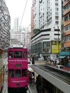 double-decker bus on the road in hong kong