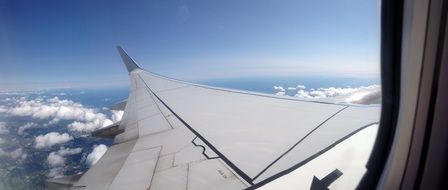 airplane wing in the clouds