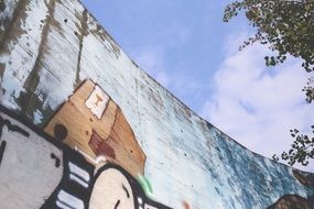 street art, graffiti on blue wall