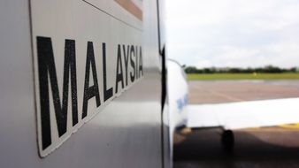 diamond da40 airplane with Malaysia sign on ground