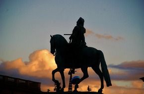 bronze equestrian statue in the evening