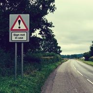 warning road sign on a roadside