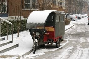 taxi auto on a snowy street