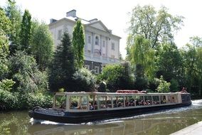 cruise ship is sailing the canal