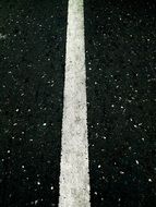 white line on a black road