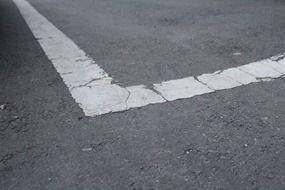 crossed asphalt road