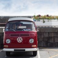 burgundy Volkswagen campervan