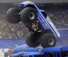 monster truck is standing on the rear wheels