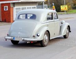 gray old car on the track