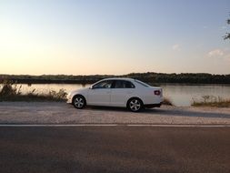 volkswagen auto on a river bank