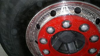 car wheel with a red rim close-up