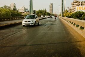 grey car on highway, india