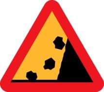 falling rocks stones road sign