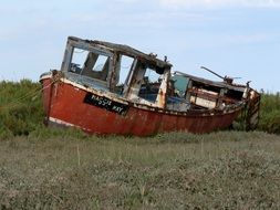 rusty boat stranded