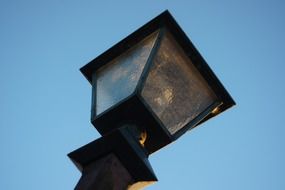 street lantern against the blue sky