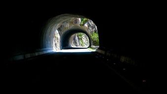 the dark alpine tunnel road