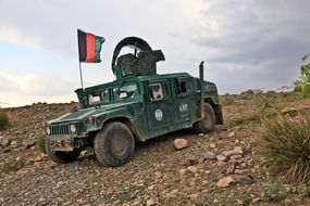 army military car in the landscape of afghanistan