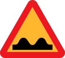 warning sign about road bumps