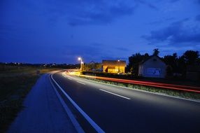 road with lanterns on the side of the road