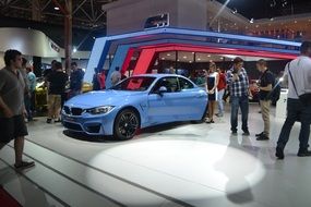 blue bmw car on the international auto show