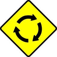 roundabout, yellow and black traffic sign