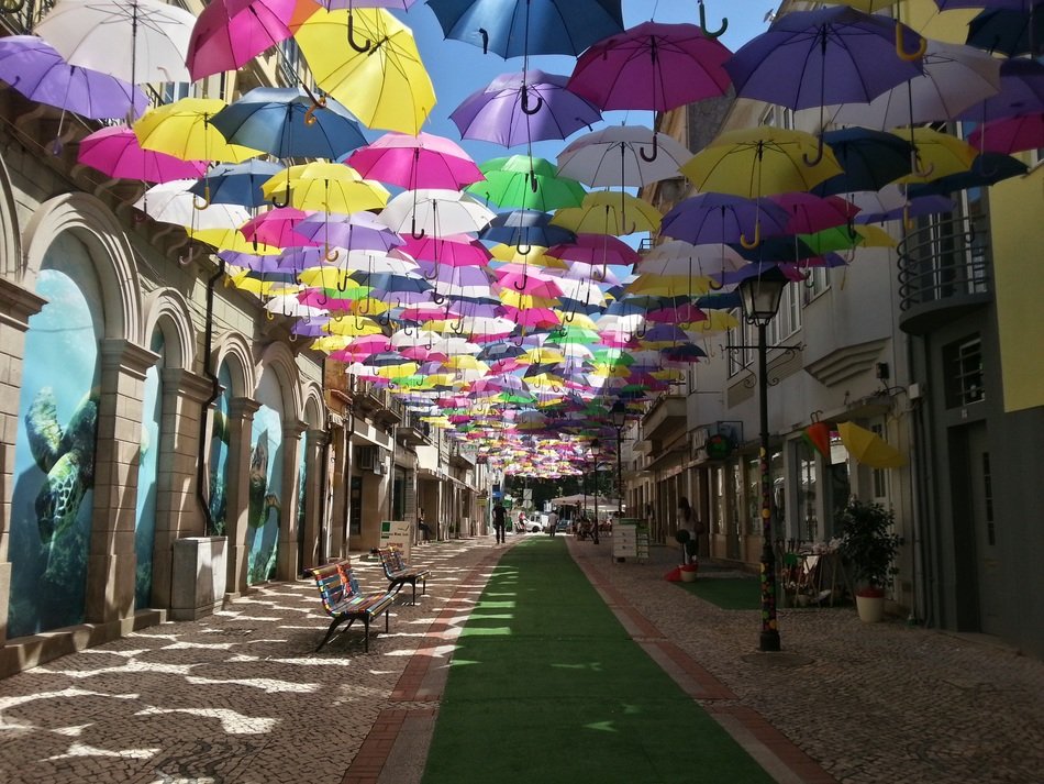 soaring umbrellas on the street of the city of Agueda