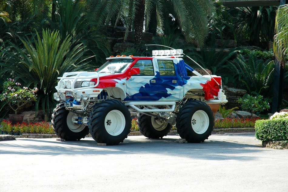 colorful all-terrain vehicle in a tropical park