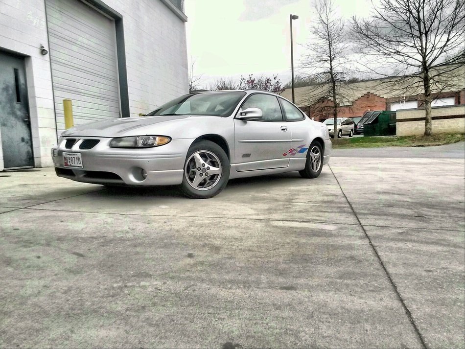 gray car near the building