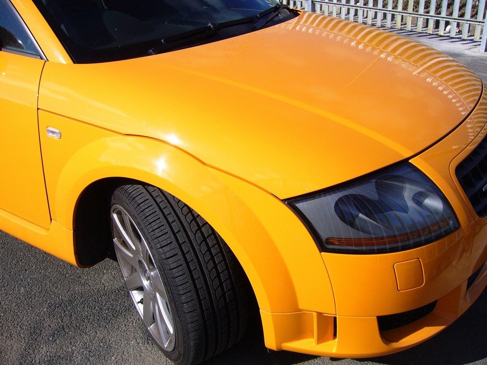 front view of a yellow car