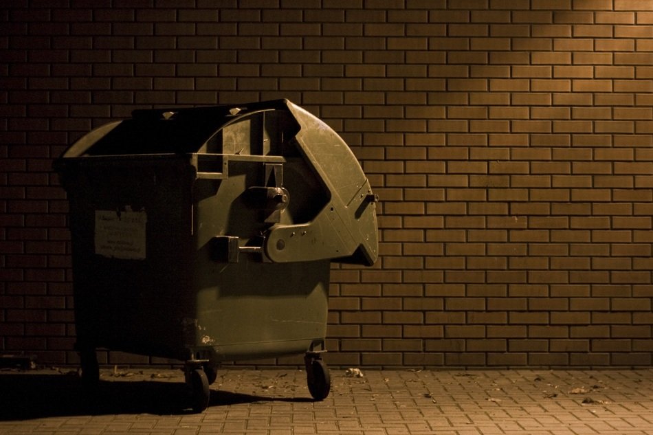 trash can under the light bulb