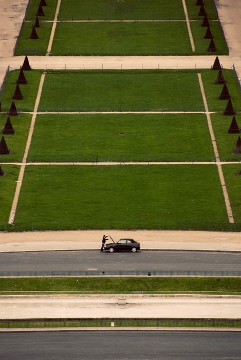 Ð° broken car on a background of green grass