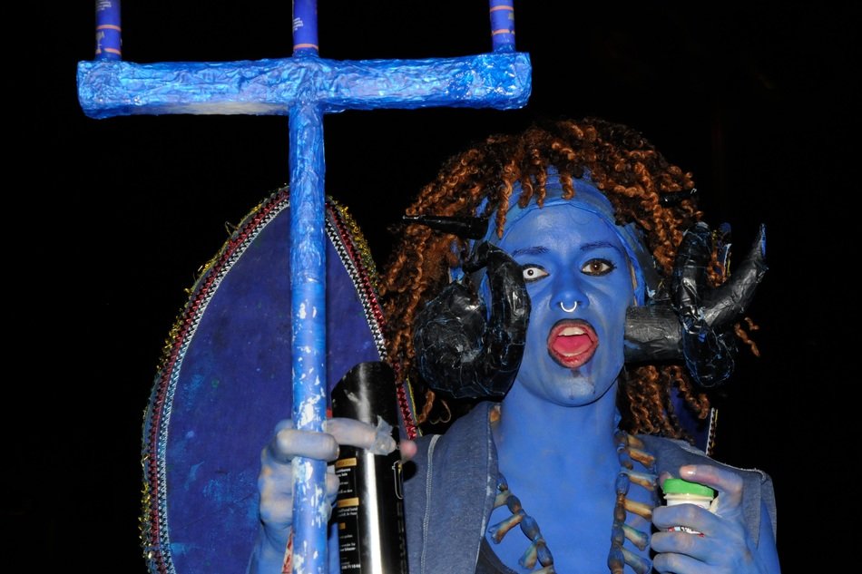 scary woman with crosses at the festival