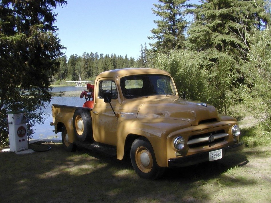 Yellow truck near the lake
