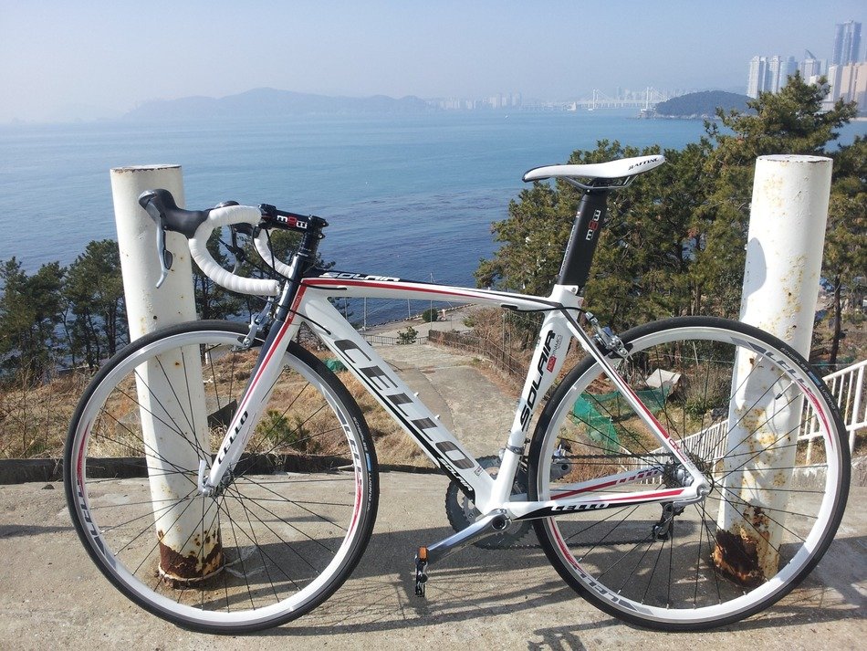 sports bike on road in view of sea