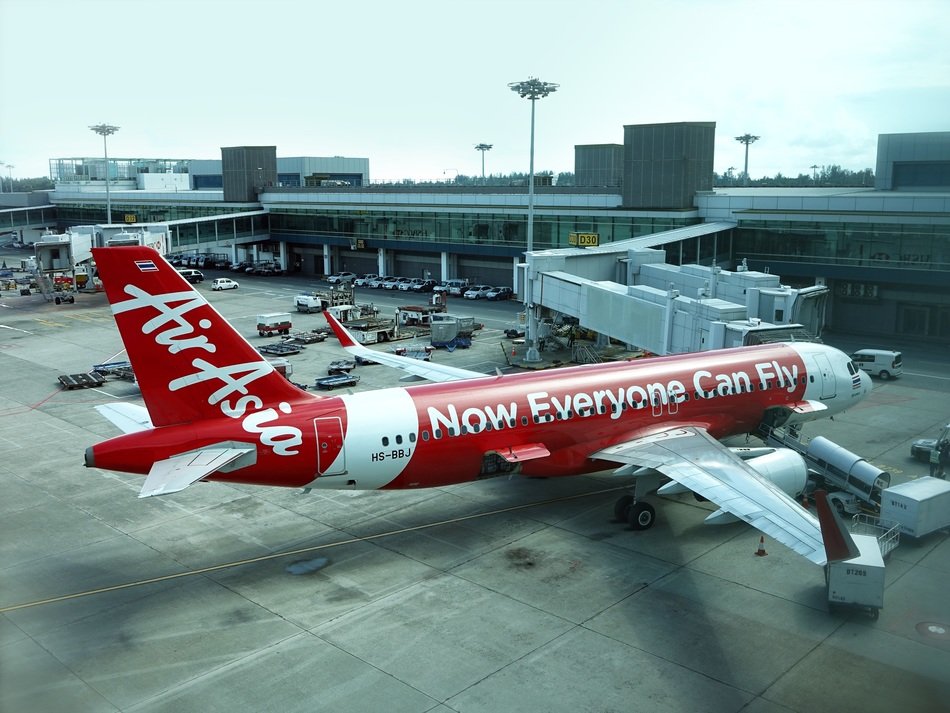 red plane at the airport