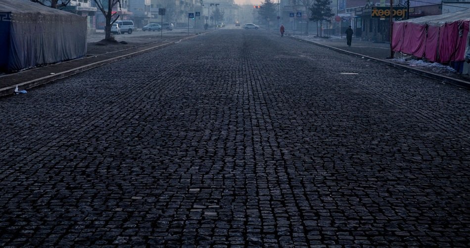 empty brick street at sunrise, mongolia