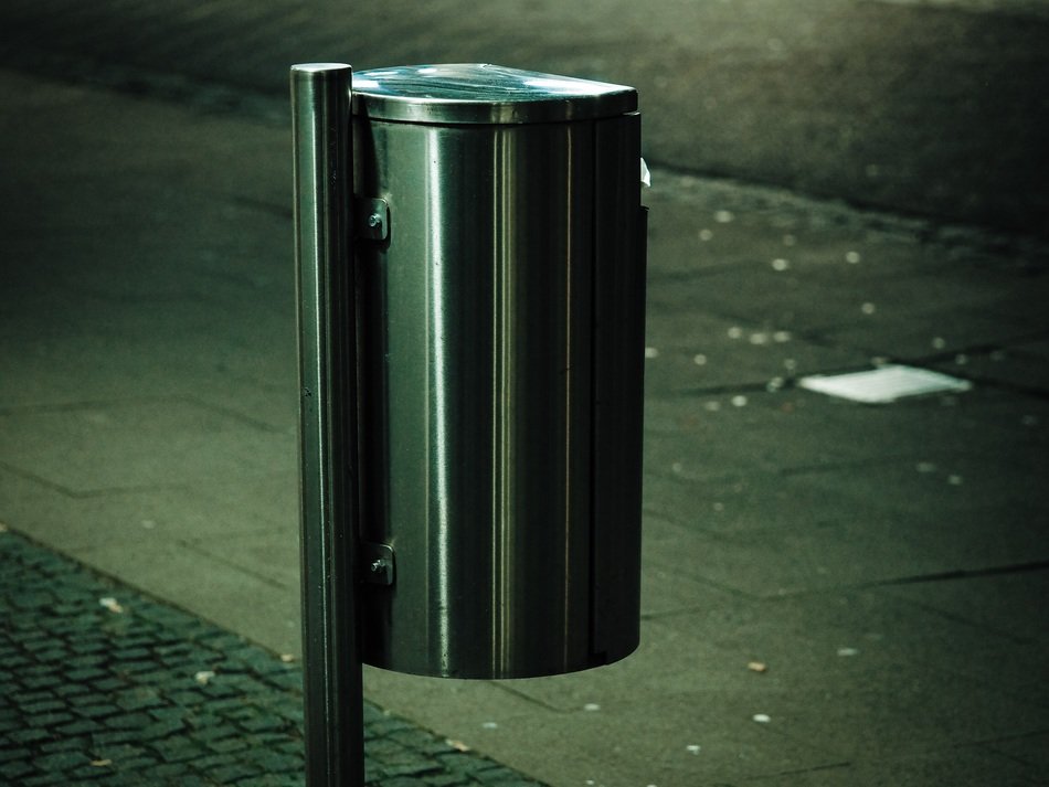 metallic garbage can on street